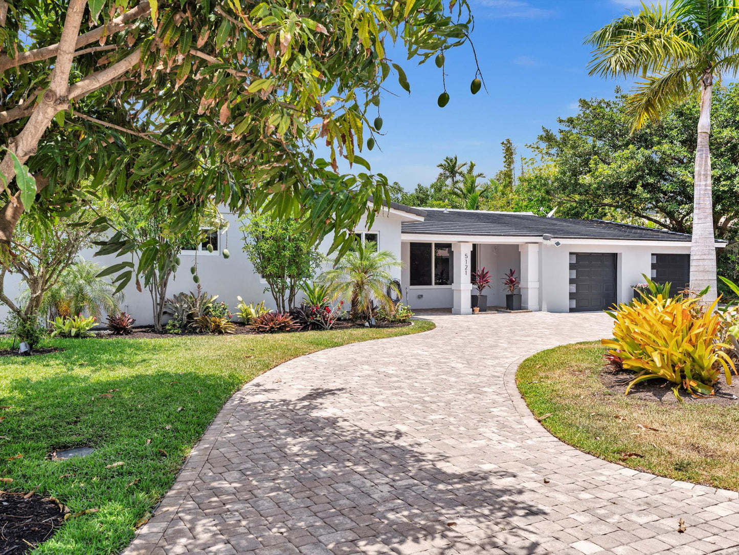 Tropical Garden Oasis | 4BR / 3BA Pool Home in Lighthouse Point - Main Image