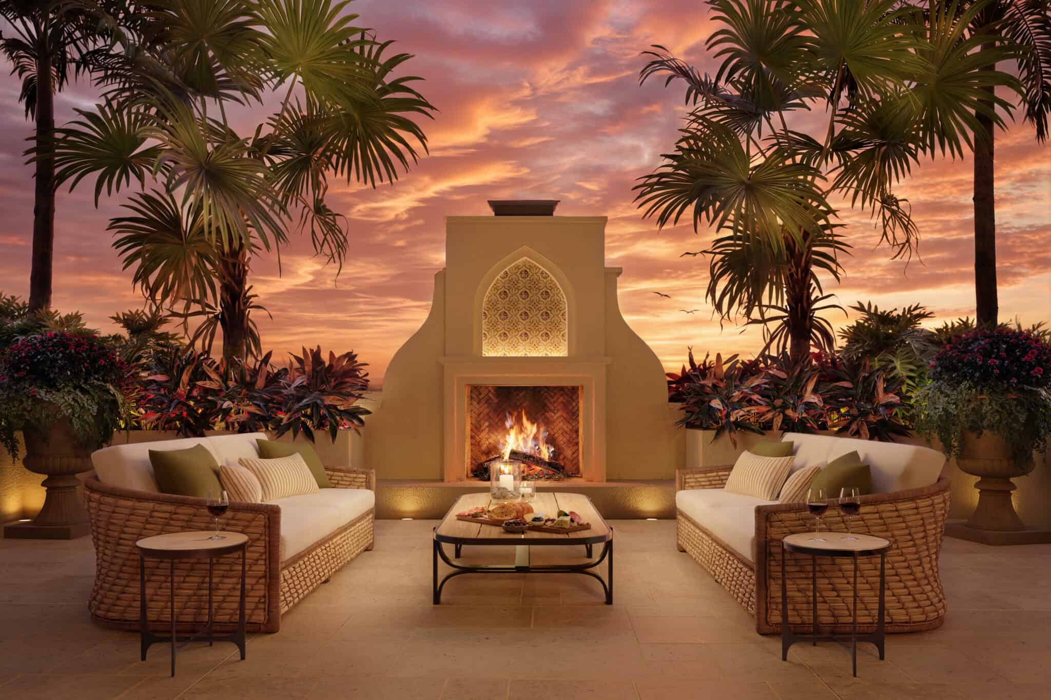 Rendering of the outdoor fireplace lounge at sunset at Mira Mar Sarasota