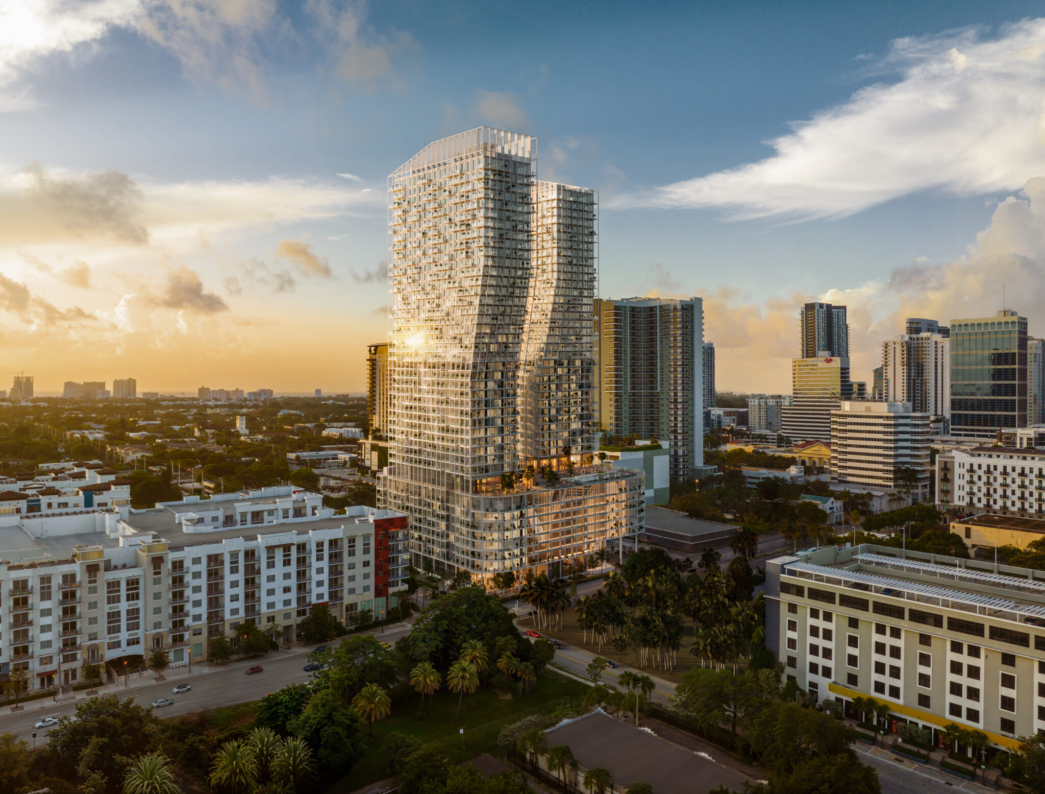 Aerial rendering of the Ombelle Fort Lauderdale towers above Flagler Village at sunset