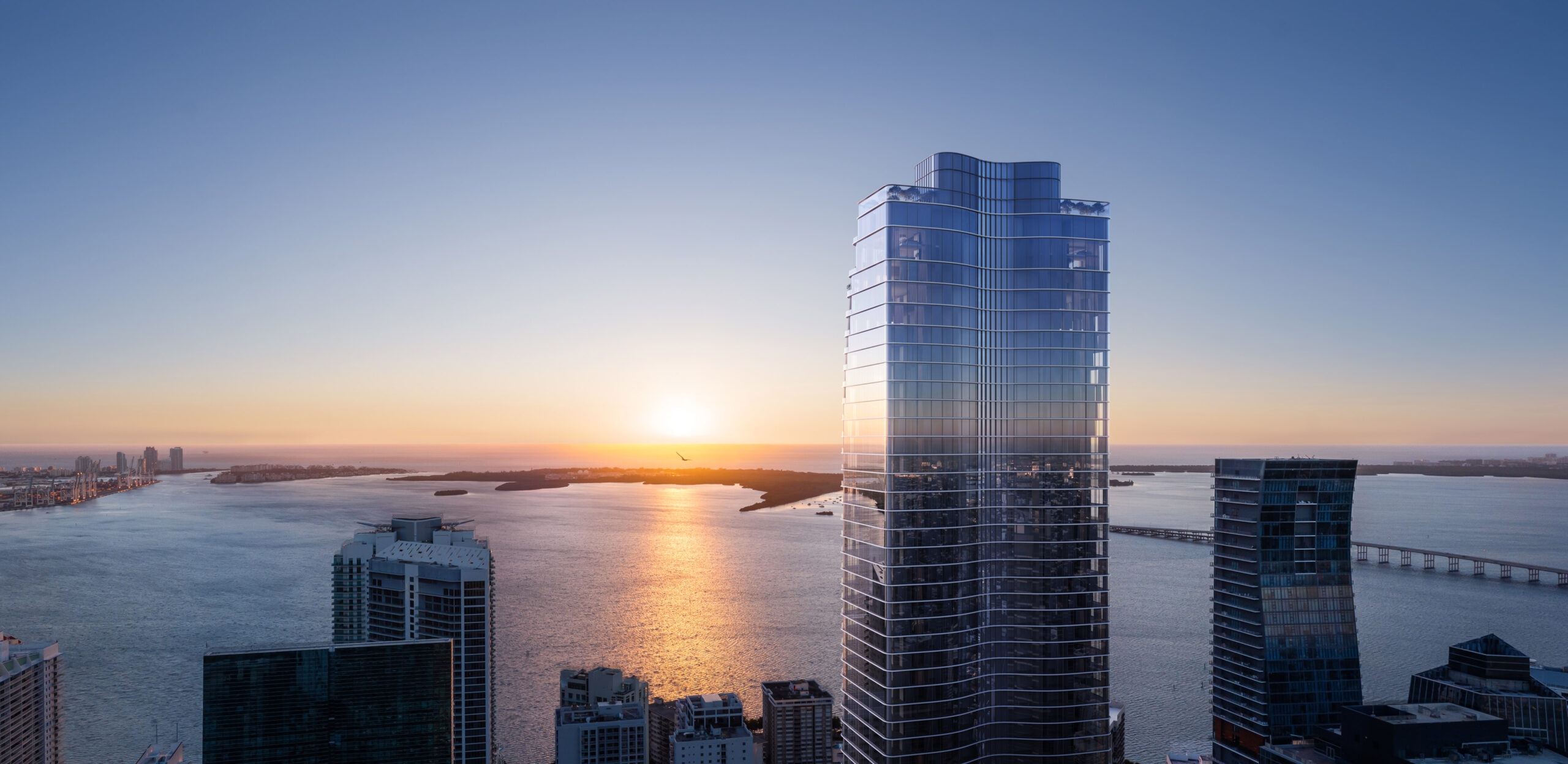 Rendering of The Residences at 1428 Brickell tower at sunset above Brickell and Biscayne Bay