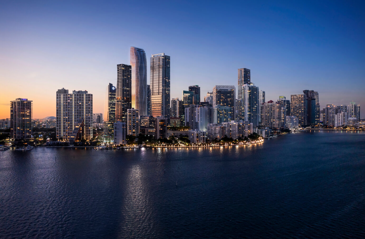 Rendering of the Brickell skyline and Biscayne Bay at dusk