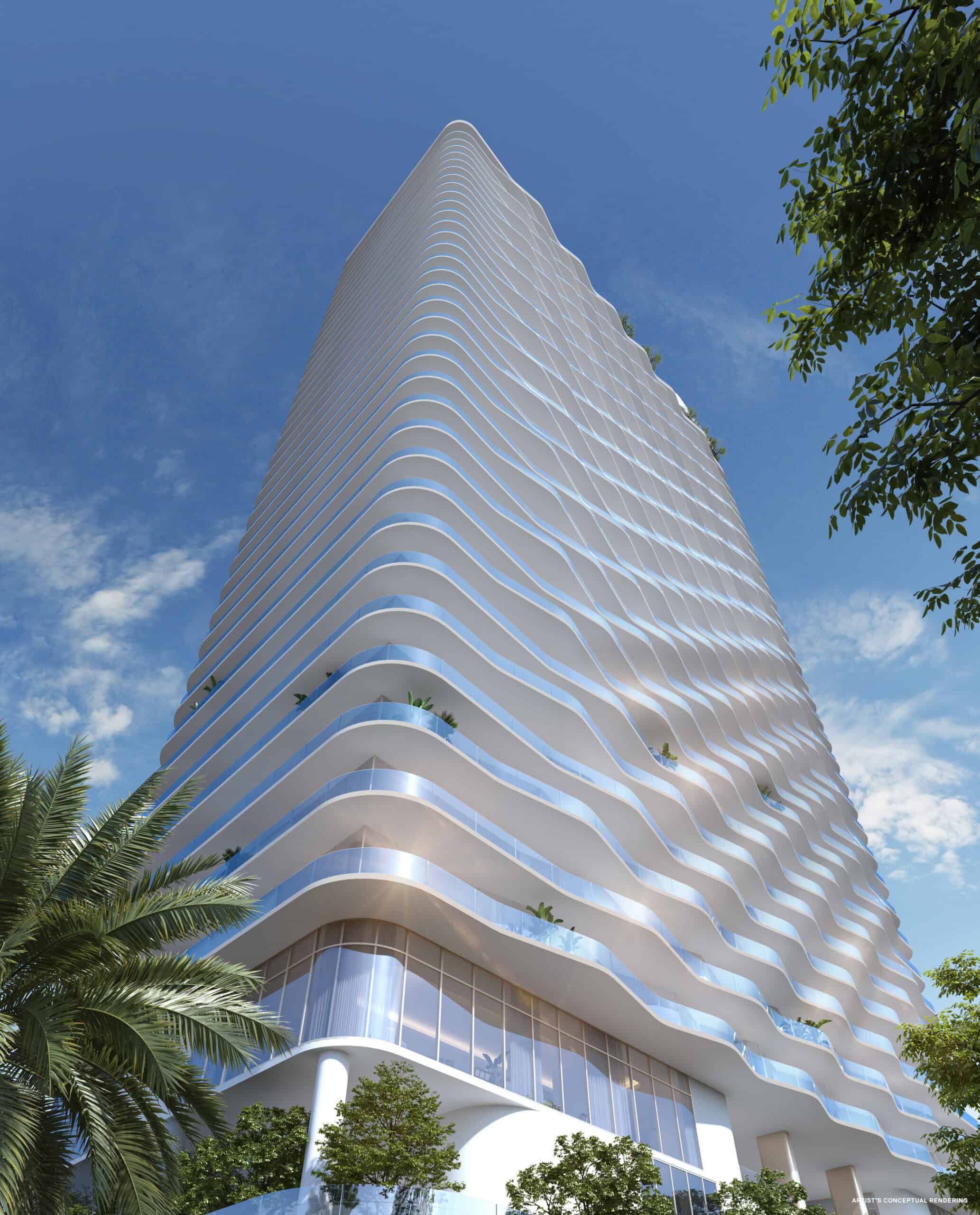 Looking up at the curved glass facade of Andare Residences by Pininfarina at 521 East Las Olas Boulevard
