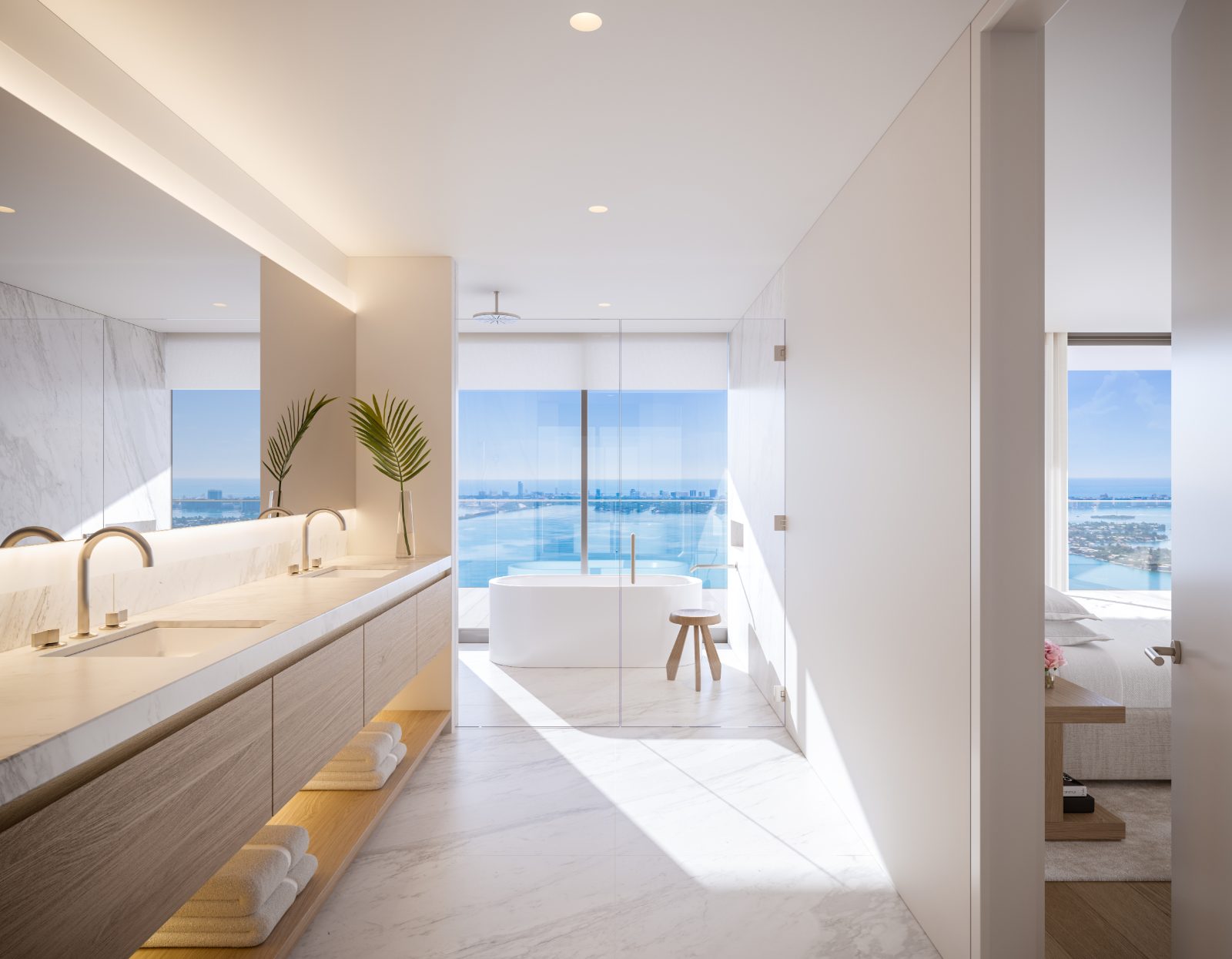 Rendering of an owner's bathroom with double vanity and free-standing tub at EDITION Residences Miami Edgewater