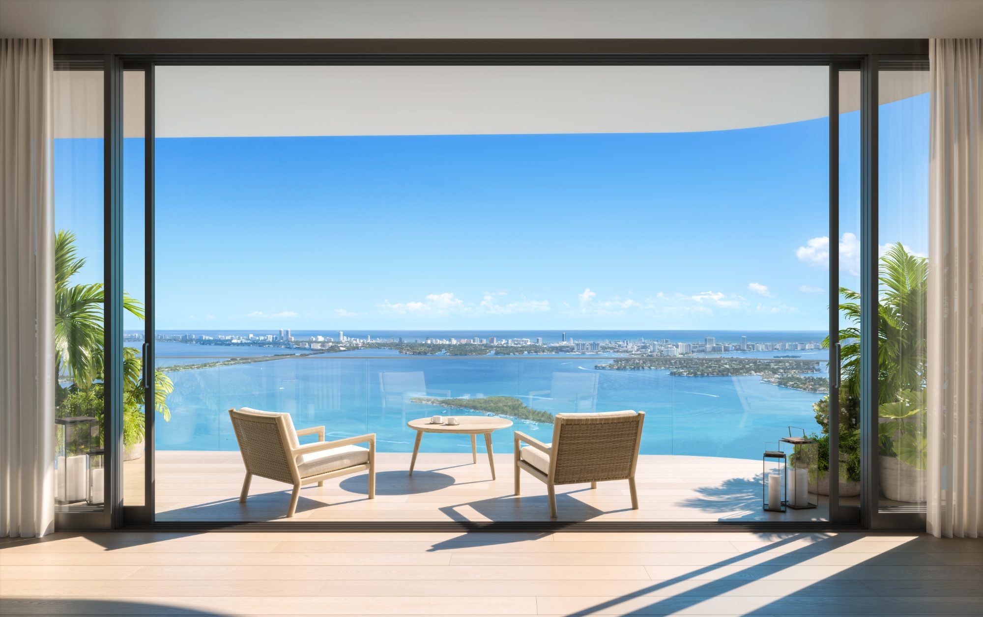 Rendering of a residence terrace with sliding glass doors overlooking Biscayne Bay at EDITION Residences Miami Edgewater
